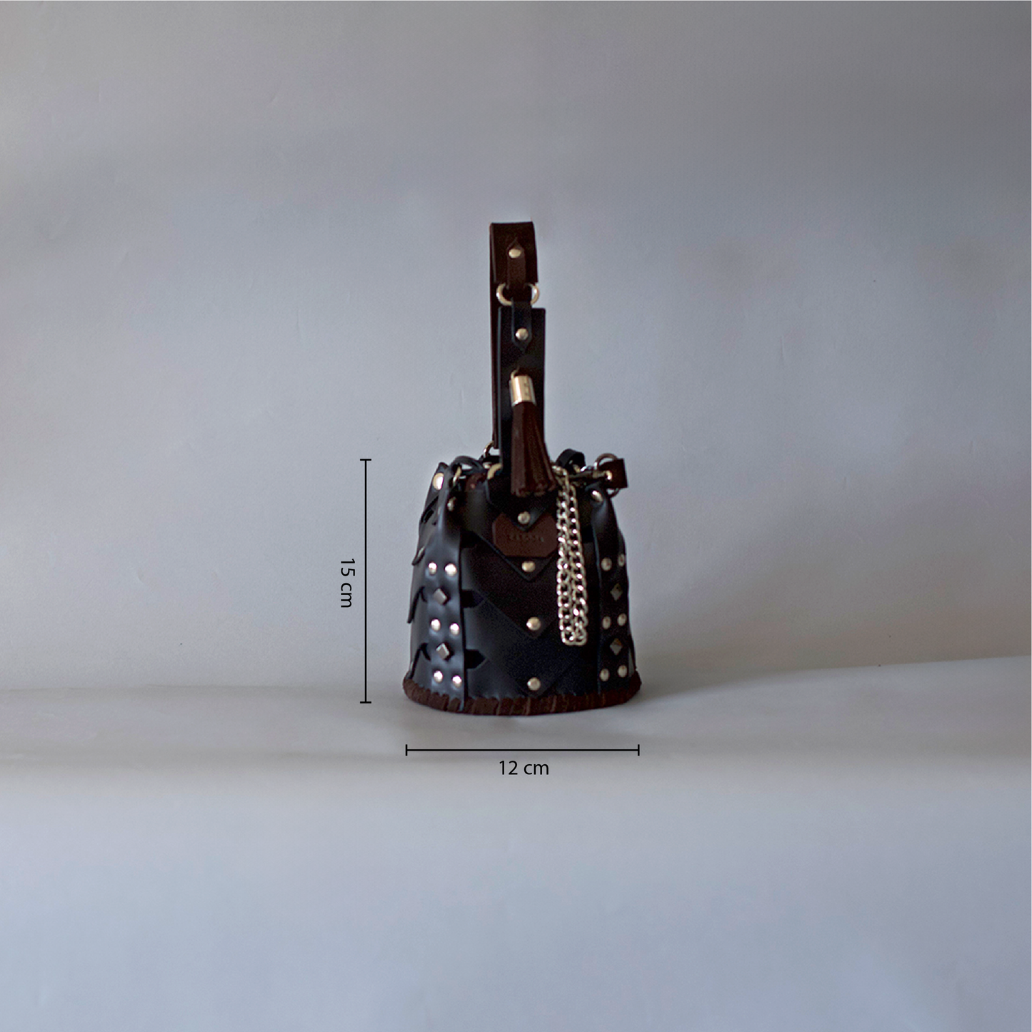 Vertebrae Mini - Black Smooth Leather on Brown Suede
