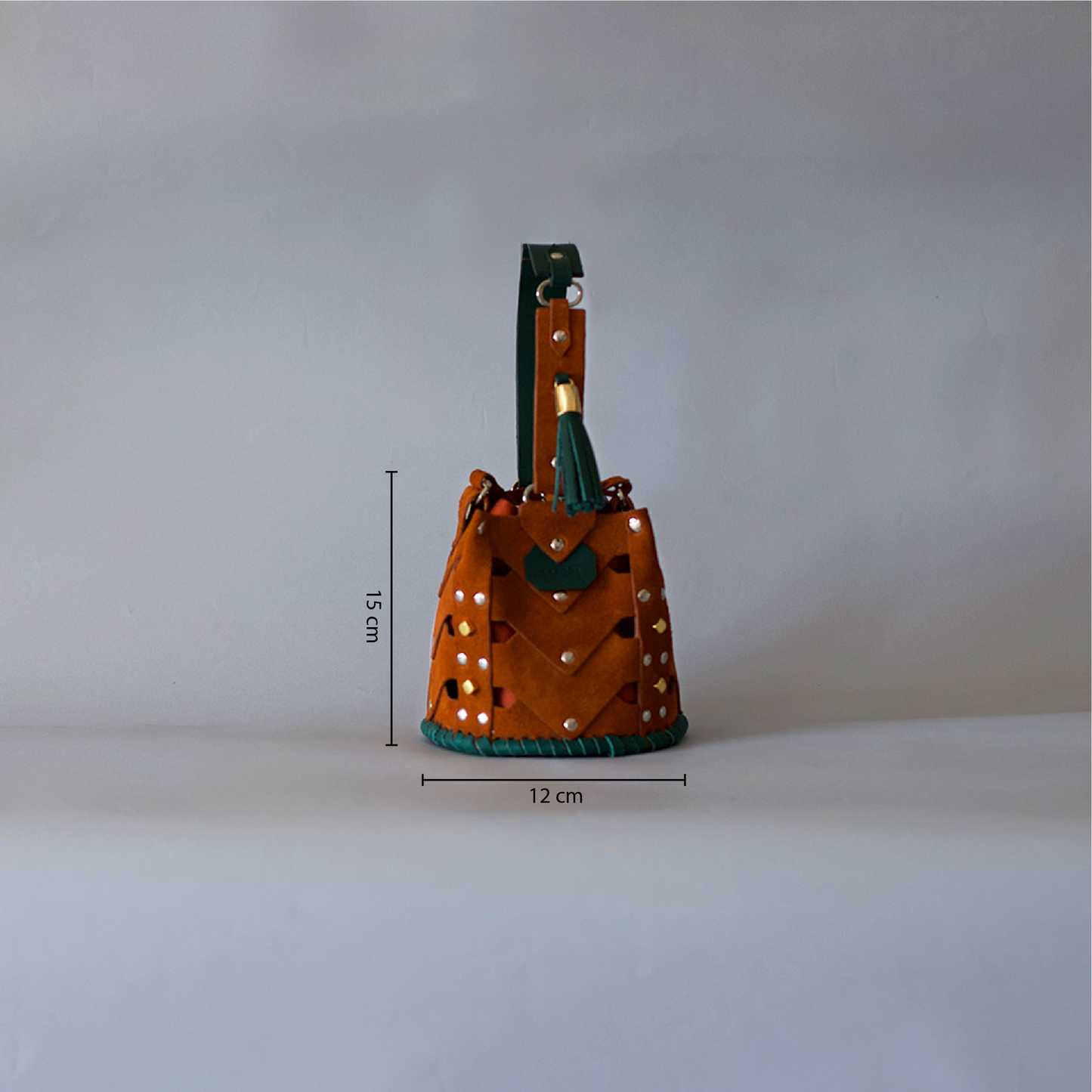 Vertebrae Mini, Rust Suede on Green Smooth Leather